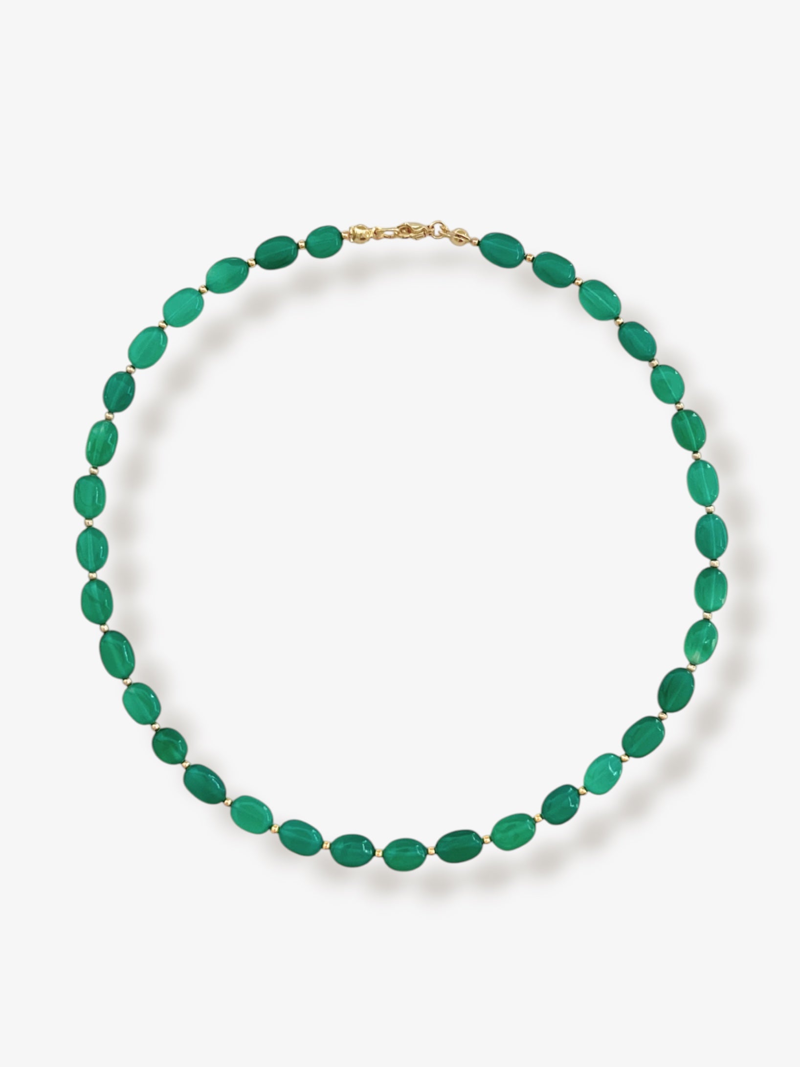 Green onyx gemstone necklace with green smooth oval beads and 14k gold filled or solid gold clasp with a minimalist design on a neutral background