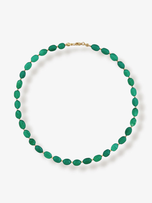 Green onyx gemstone necklace with green smooth oval beads and 14k gold filled or solid gold clasp with a minimalist design on a neutral background