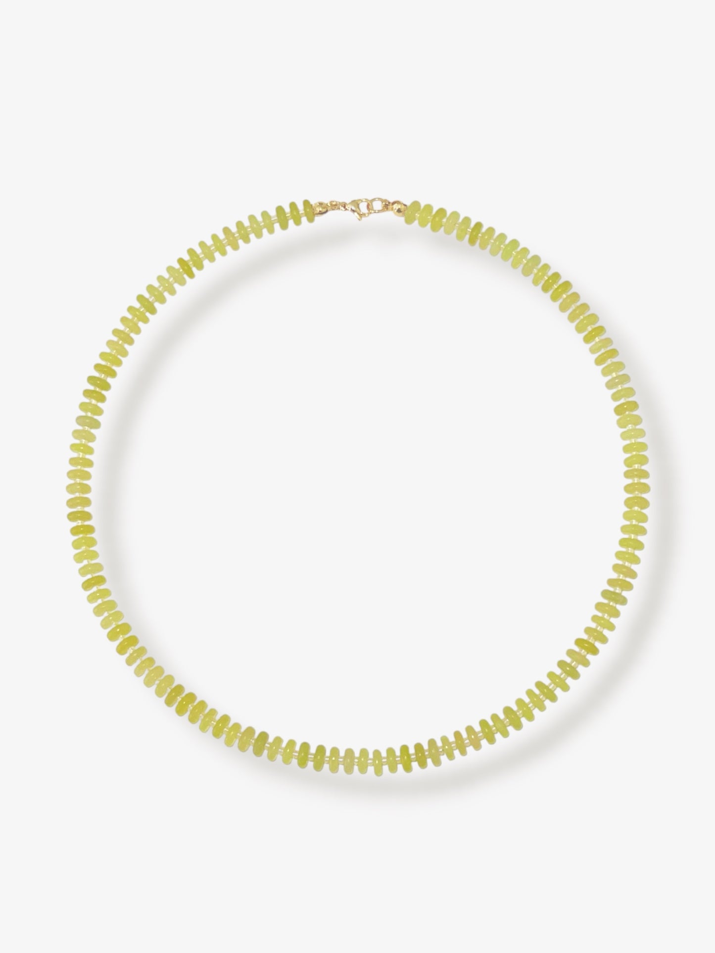 Lemon jade beaded gemstone necklace with yellow smooth disc rondelle stone beads, sparkling Japanese seed beads and 14k gold filled or solid gold clasp with minimalist design on a neutral background