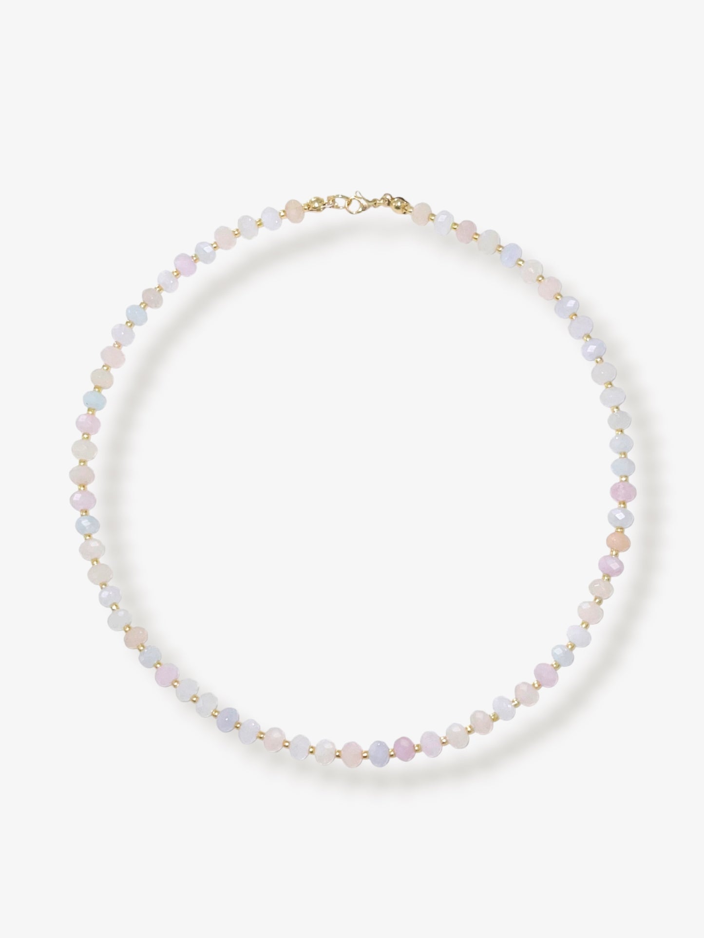 Dainty morganite beaded gemstone necklace with soft pastel hues of blush pink, peach, blues and green, with faceted rondelle beads finished with 14k gold filled accent beads and clasp with minimalist design on a neutral background