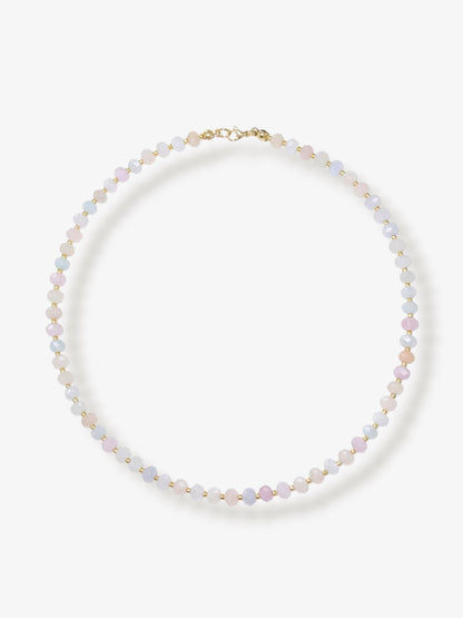 Dainty morganite beaded gemstone necklace with soft pastel hues of blush pink, peach, blues and green, with faceted rondelle beads finished with 14k gold filled accent beads and clasp with minimalist design on a neutral background