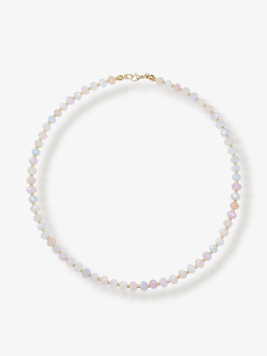 Dainty morganite beaded gemstone necklace with soft pastel hues of blush pink, peach, blues and green, with faceted rondelle beads finished with 14k gold filled accent beads and clasp with minimalist design on a neutral background
